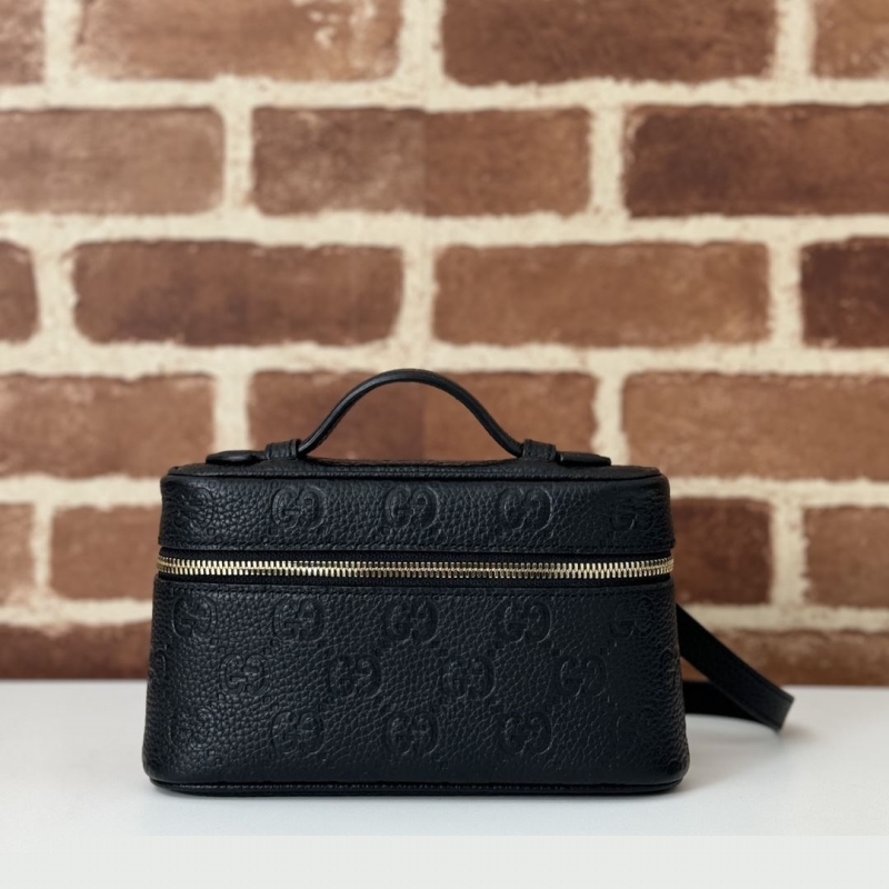 G*u*i cosmetic bags
